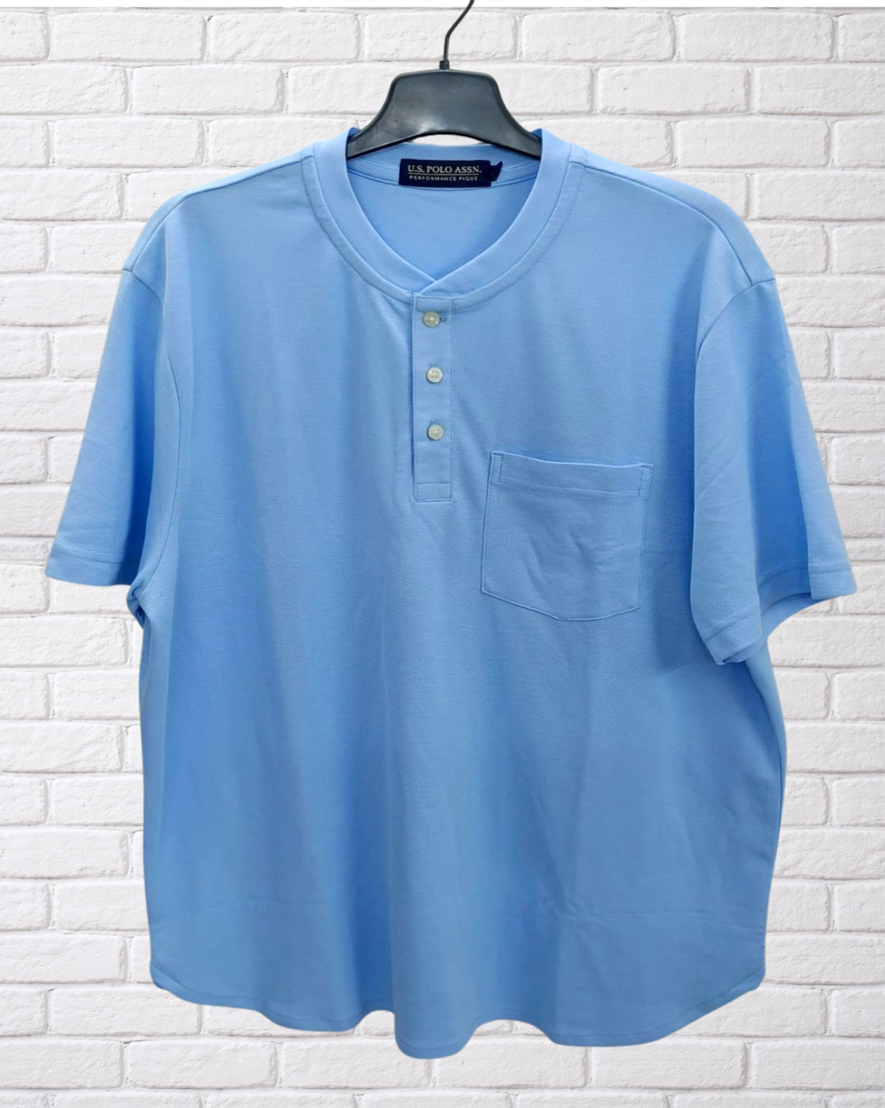 U.S.-Polo-Assn.-Women’s-light-Blue-Henley-T-Shirt U.S. Polo Assn. Women’s Light Blue Henley T-Shirt - Image 1